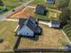 Aerial view captures the backyard, showcasing the home and separate garage at 4189 Brandy Creek Ct, Clover, SC 29710