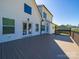 Backyard features a grey deck with access to the lawn at 4189 Brandy Creek Ct, Clover, SC 29710