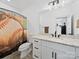 Bathroom featuring a vanity, toilet and baseball themed shower curtain at 4189 Brandy Creek Ct, Clover, SC 29710