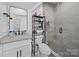 Bathroom featuring granite sink, toilet, and glass shower at 4189 Brandy Creek Ct, Clover, SC 29710