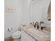 Modern bathroom features a granite countertop vanity, new fixtures, and a toilet at 4189 Brandy Creek Ct, Clover, SC 29710