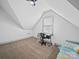 Attic bedroom featuring carpet and a ceiling fan at 4189 Brandy Creek Ct, Clover, SC 29710