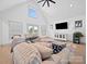 Spacious living room features vaulted ceilings, neutral color scheme, and large windows at 4189 Brandy Creek Ct, Clover, SC 29710