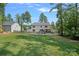 Exterior view of home featuring a large fenced yard and patio area at 4195 Island Fox Ln, Denver, NC 28037