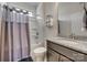Bright bathroom with granite countertop, shower and tub combination, and modern fixtures at 4502 Middlebury Ln, Fort Mill, SC 29715