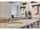Granite countertop and dual sinks add elegance to this bathroom, with updated fixtures and decor at 4502 Middlebury Ln, Fort Mill, SC 29715