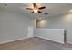 Well lit room great for entertaining with carpet and neutral walls, perfect for a bonus room at 4502 Middlebury Ln, Fort Mill, SC 29715