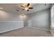 Large bonus room with a ceiling fan, a well lit room perfect for entertaining or recreation at 4502 Middlebury Ln, Fort Mill, SC 29715
