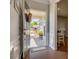 Inviting entryway with hardwood floors, stylish decor, and a view of the outdoors at 4502 Middlebury Ln, Fort Mill, SC 29715