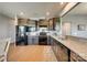 Spacious kitchen featuring granite countertops, ample cabinets, and stainless steel appliances at 4502 Middlebury Ln, Fort Mill, SC 29715