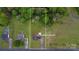 Aerial view of the property with a large grassy yard and mature trees, with the home's address clearly marked at 4773 Westwinds Rd, Lincolnton, NC 28092