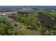 Home near a winding path and surrounded by lush trees, creating a private and peaceful setting at 4773 Westwinds Rd, Lincolnton, NC 28092
