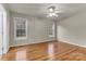 Bright bedroom with hardwood floors and natural light from two windows offers a cozy retreat at 4773 Westwinds Rd, Lincolnton, NC 28092