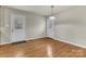 Cozy dining area with hardwood floors and two doors, perfect for easy access and natural light at 4773 Westwinds Rd, Lincolnton, NC 28092