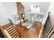 Bright living room featuring a stone fireplace, hardwood floors and a vaulted ceiling at 4904 Ardenetti Ct, Mint Hill, NC 28227