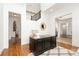 A bright and spacious office features hardwood floors and a staircase at 4904 Ardenetti Ct, Mint Hill, NC 28227