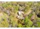 Charming home surrounded by a lush canopy of green trees at 605 Ottawa Dr, Rock Hill, SC 29732