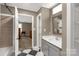 Bright bathroom with black and white tile floor and connecting door to a bedroom at 605 Ottawa Dr, Rock Hill, SC 29732
