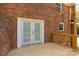 Bright, wood deck with white french doors and a brick exterior at 605 Ottawa Dr, Rock Hill, SC 29732