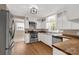 Bright kitchen with stainless steel appliances and white cabinetry at 605 Ottawa Dr, Rock Hill, SC 29732