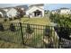This is a fenced backyard with landscaping and a view of the neighborhood at 6499 Gopher Rd, Lancaster, SC 29720
