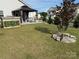 This backyard boasts a lovely patio with a gazebo, a built-in grill, and plenty of green space at 6499 Gopher Rd, Lancaster, SC 29720