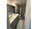 Bright bathroom featuring a double sink vanity, soft decor rugs, and shower curtain at 6499 Gopher Rd, Lancaster, SC 29720