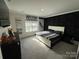 Modern bedroom featuring carpeted floor, a large window, and stylish accents at 6499 Gopher Rd, Lancaster, SC 29720