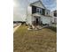 Charming two-story home featuring manicured lawn and rock garden at 6499 Gopher Rd, Lancaster, SC 29720