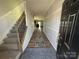 Welcoming hallway featuring wood floors, decorative wall trim, and an inviting entryway at 6499 Gopher Rd, Lancaster, SC 29720