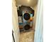 Efficient laundry room with modern stacked washer/dryer and ample storage at 6499 Gopher Rd, Lancaster, SC 29720