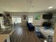 Stylish living room with modern decor, wood flooring, and ample natural light at 6499 Gopher Rd, Lancaster, SC 29720