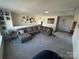 Upstairs loft area features comfortable seating and plenty of natural light at 6499 Gopher Rd, Lancaster, SC 29720