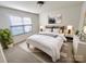 Cozy main bedroom with neutral tones, plush carpeting, and serene decor at 6525 Soapstone Dr, Charlotte, NC 28269