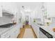 Bright kitchen boasts granite countertops, stainless steel appliances, and ample cabinet space at 6744 Wheeler Dr, Charlotte, NC 28211