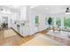 Sitting area flows from kitchen to a view of the backyard at 6744 Wheeler Dr, Charlotte, NC 28211
