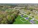 The aerial view highlights the property, situated in a green area near schools and other homes at 7205 Church Rd, Taylorsville, NC 28681