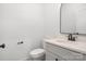 Powder room featuring modern fixtures, gray vanity, quartz countertop, and black hardware at 7205 Church Rd, Taylorsville, NC 28681