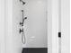 Modern bathroom boasts sleek white subway tile shower and matte black fixtures at 7205 Church Rd, Taylorsville, NC 28681