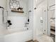 Beautiful bathroom featuring a soaking tub, glass enclosed shower and decorative accents at 7324 Swans Run Rd, Charlotte, NC 28226