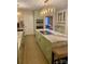 Modern kitchen with granite countertops, stainless steel appliances, and a central island cooktop at 815 21St Avenue Nw Dr, Hickory, NC 28601