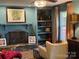 Cozy living room with unique built-ins, fireplace, and stylish decor at 815 21St Avenue Nw Dr, Hickory, NC 28601