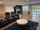 Cozy living room features hardwood floors, a window, and comfortable seating arrangement at 815 21St Avenue Nw Dr, Hickory, NC 28601