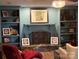Stylish living room showcasing custom built-ins, fireplace and sophisticated decor at 815 21St Avenue Nw Dr, Hickory, NC 28601