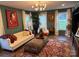 Open living room with a statement rug, modern lighting and comfortable seating at 815 21St Avenue Nw Dr, Hickory, NC 28601