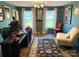 Well-lit office features modern lighting, a desk and a sitting chair at 815 21St Avenue Nw Dr, Hickory, NC 28601