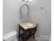 Bathroom with a vanity featuring a decorative mirror, and a stylish sink at 827 Ford Dr, Lowell, NC 28098