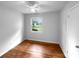 Bright, simple bedroom with hardwood floors, natural light and neutral decor at 827 Ford Dr, Lowell, NC 28098