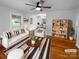 Comfortable living room with neutral decor, hardwood floors, and bright natural light at 827 Ford Dr, Lowell, NC 28098