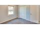 Comfortable bedroom with ample closet space and a window offering natural light at 904 Sunbeam Dr, Lincolnton, NC 28092